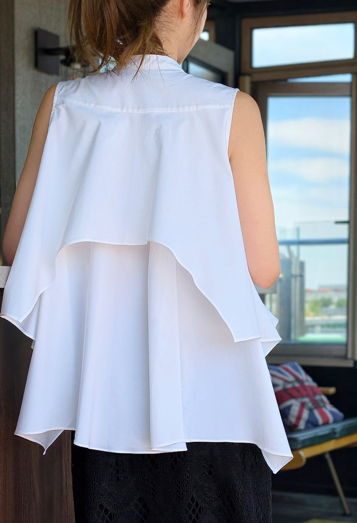 White Pure Cotton Cascading Ruffle Sleeveless Longline Blouse
