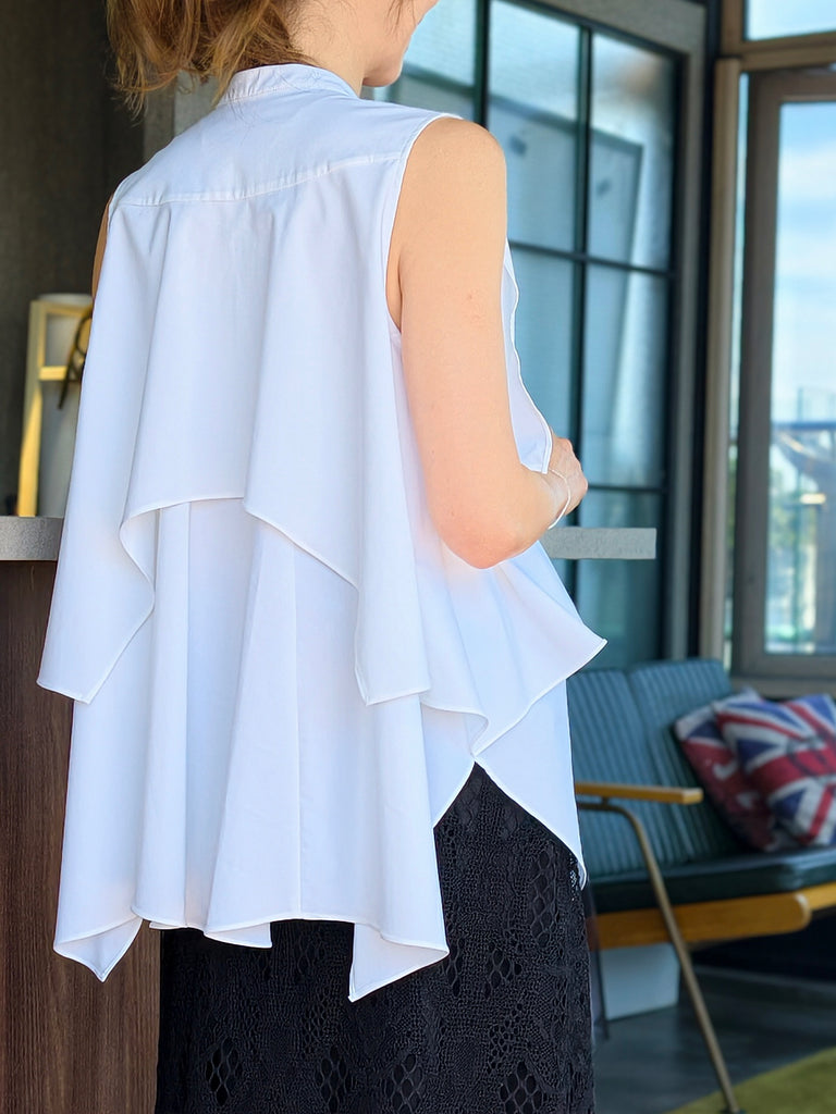 White Pure Cotton Cascading Ruffle Sleeveless Longline Blouse