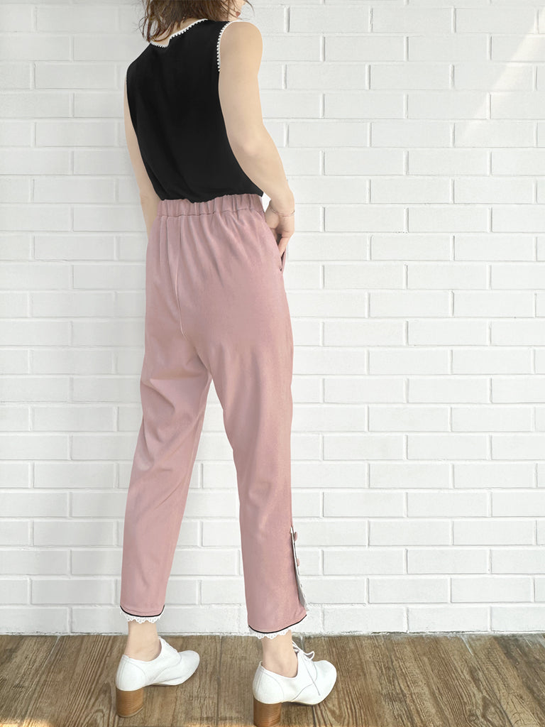 粉紅色撞色滾邊蕾絲細部錐形九分褲