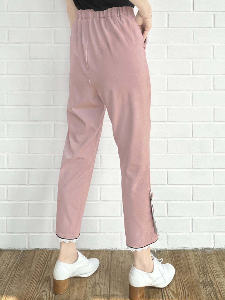 粉紅色撞色滾邊蕾絲細部錐形九分褲