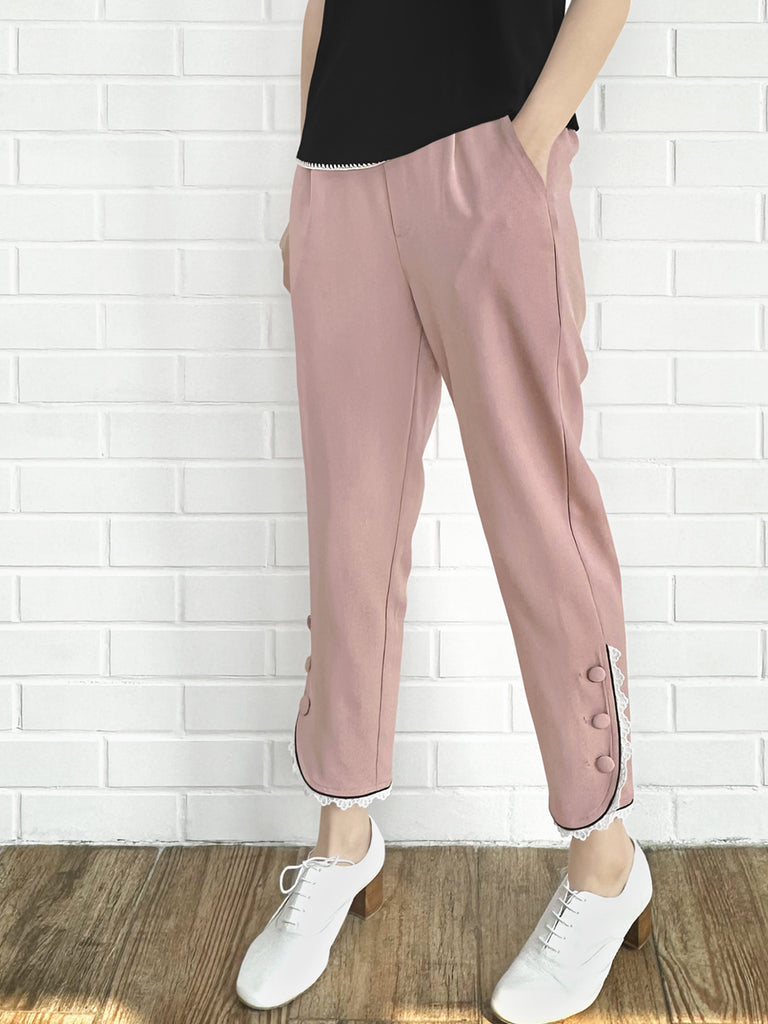 粉紅色撞色滾邊蕾絲細部錐形九分褲