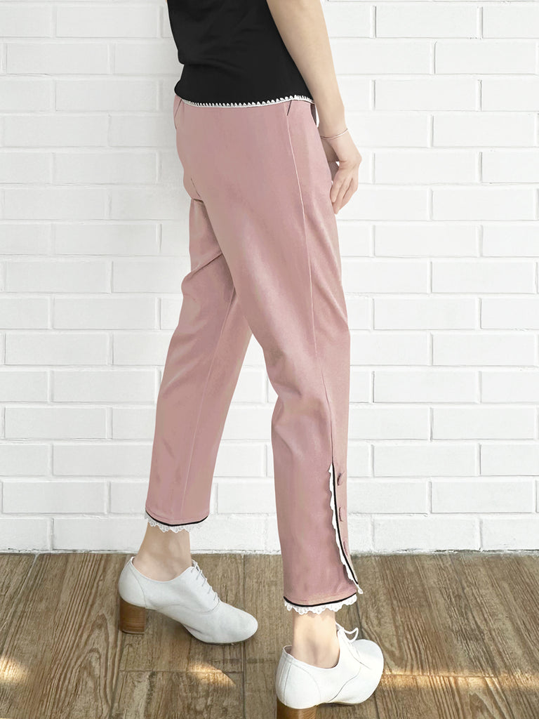 粉紅色撞色滾邊蕾絲細部錐形九分褲